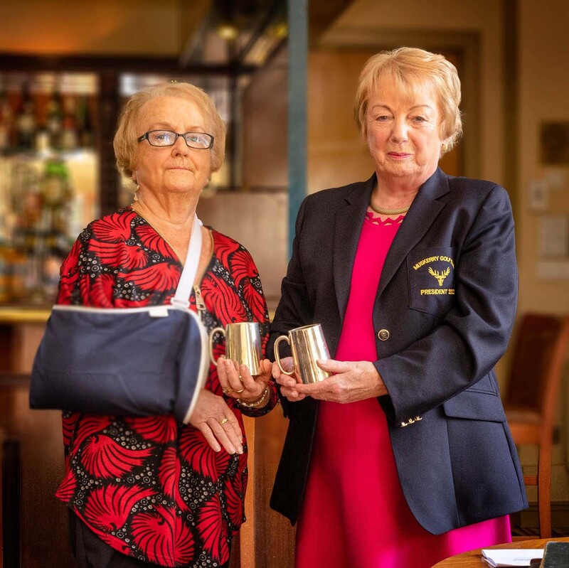 Dorothy O’Sullivan, Presenting The JJ Sheehan Tankards To Muskerry Golf Club President Marie Allen.